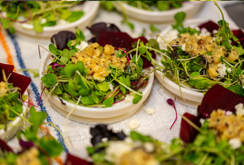 Sprouts appetizer topped with corn relish