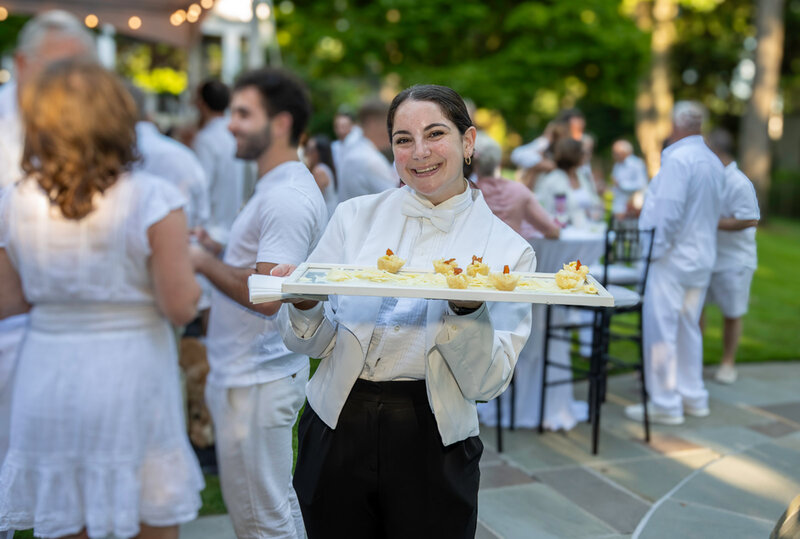 Sever holding appetizer tray