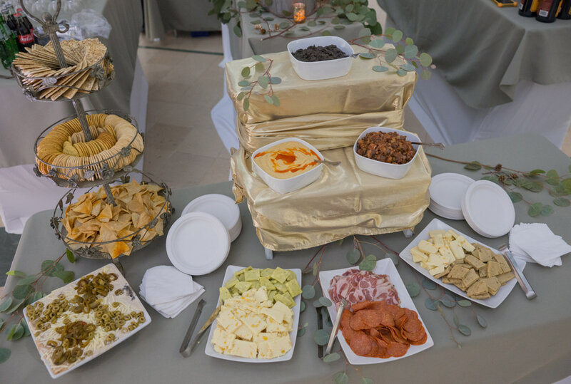 Crudite table with crackers, meats, cheeses and spreads
